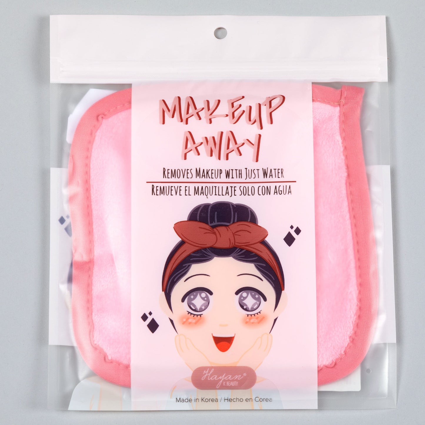 Packaged reusable makeup remover towel with a character design on the packaging, predominantly pink and white.