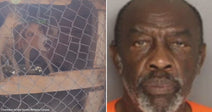 On the left, a dog barks inside a wire cage; on the right, an older man with a gray beard wears an orange shirt.
