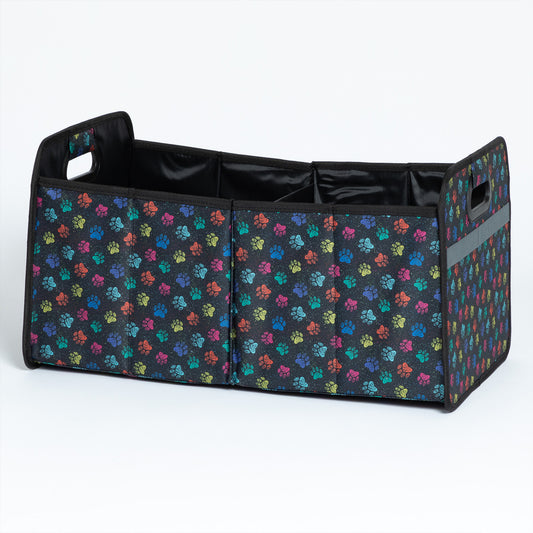 A multicolored foldable car trunk organizer with a paw print design.