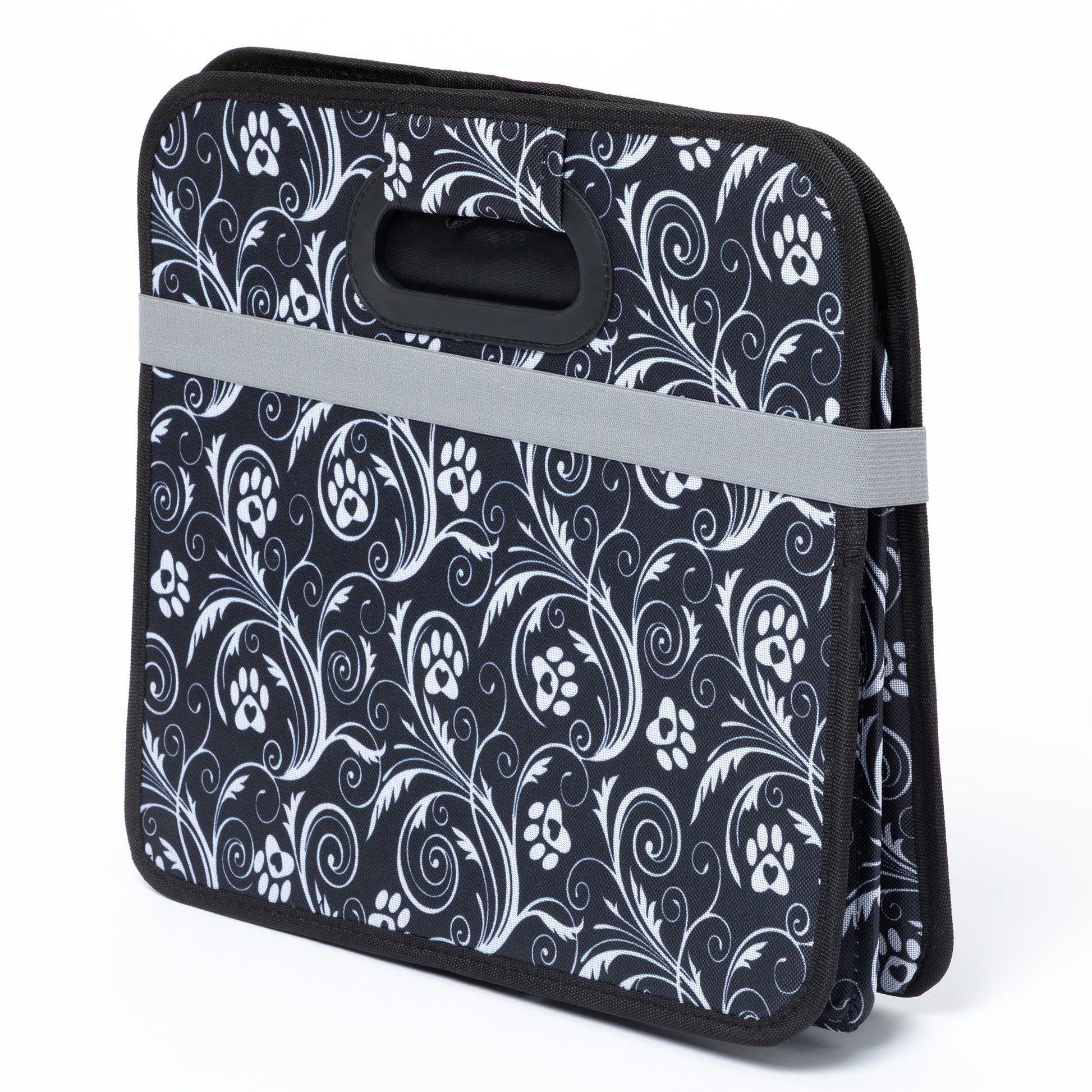 Black and white patterned bag with paw prints on a white background