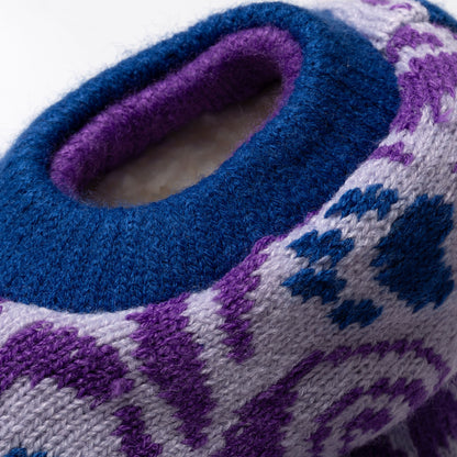 Close-up of a blue and purple knitted slipper sock cuff with a pattern, showing plush interior Paw Symphony