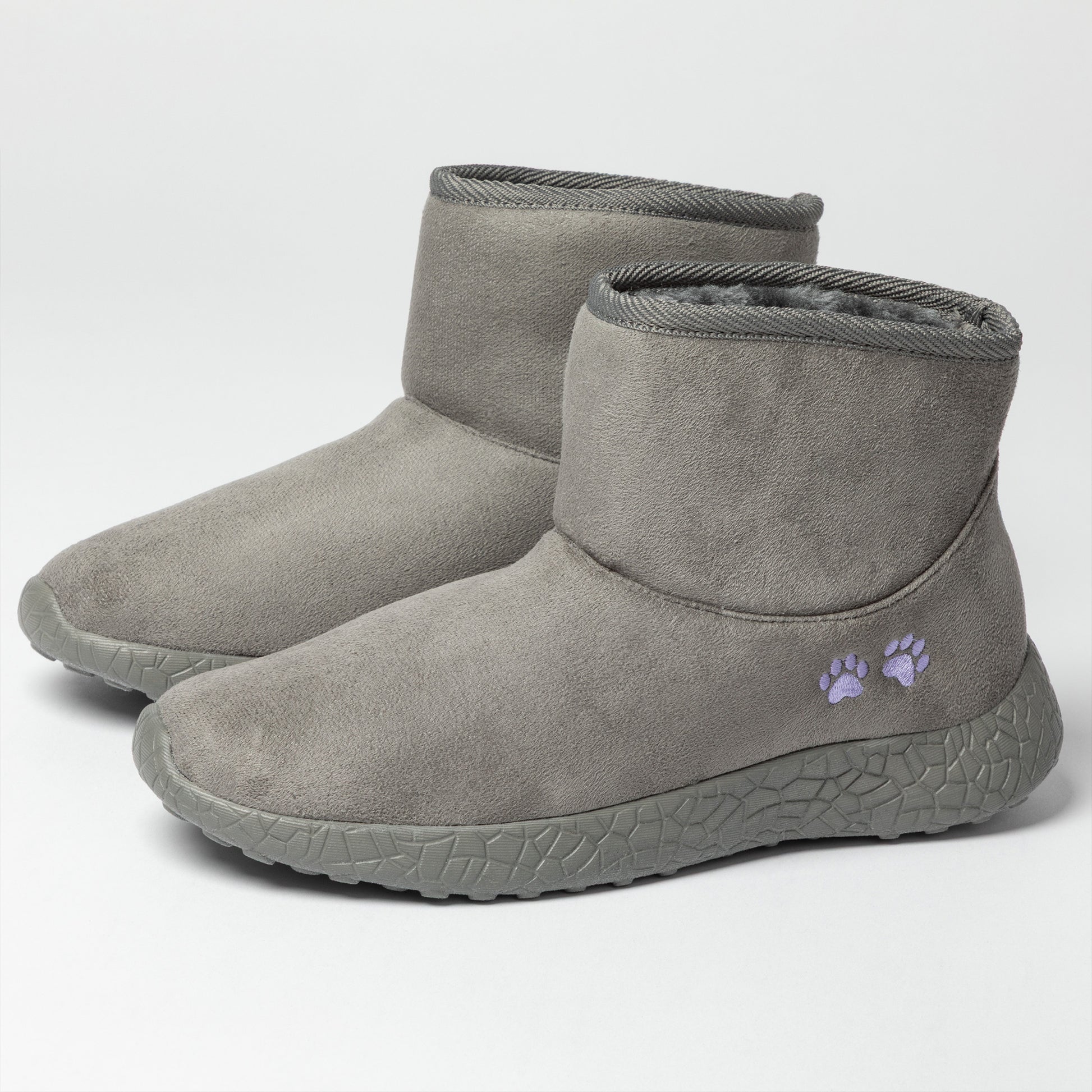 Gray ankle boots with paw prints on a white background