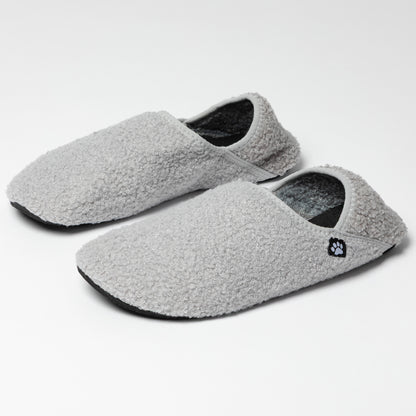 Pair of gray slippers with a paw print on a white background