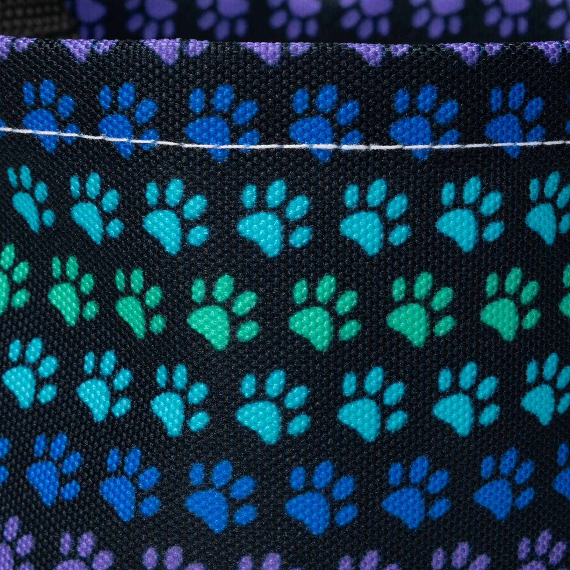 Car garbage holder cover with rainbow paw pattern. Durable fabric of the collapsible trash bin. 