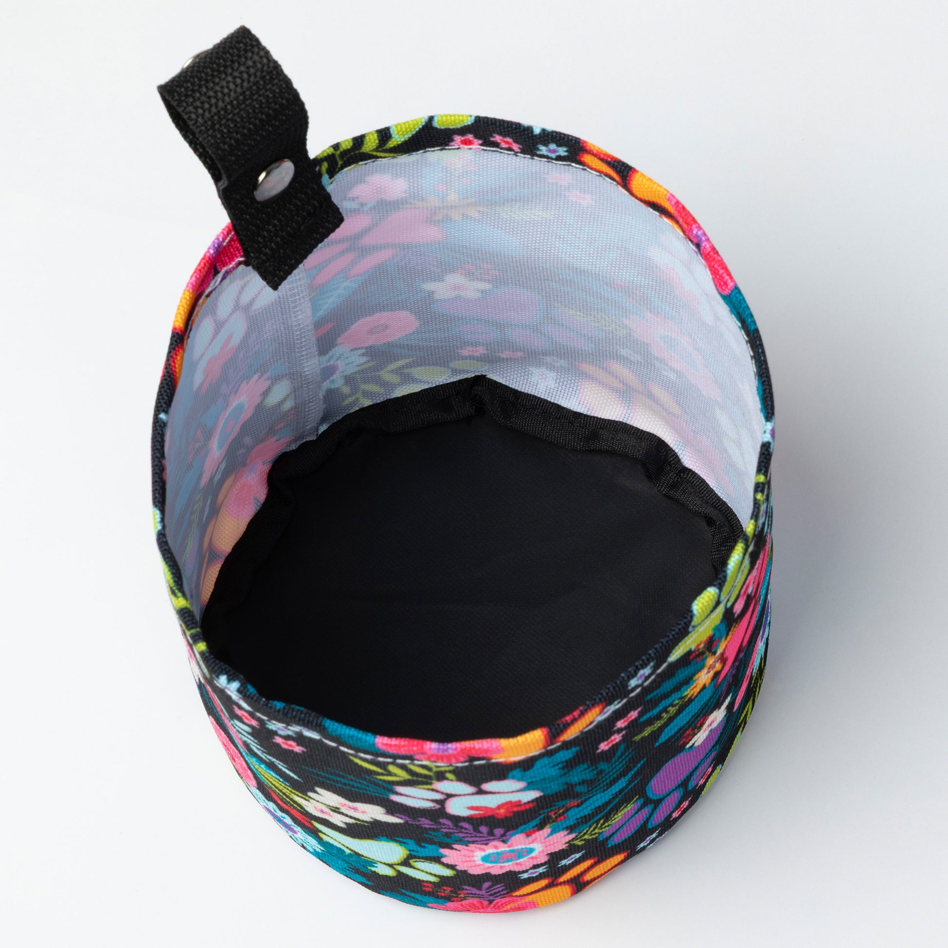 Colorful floral-patterned bag on a white background