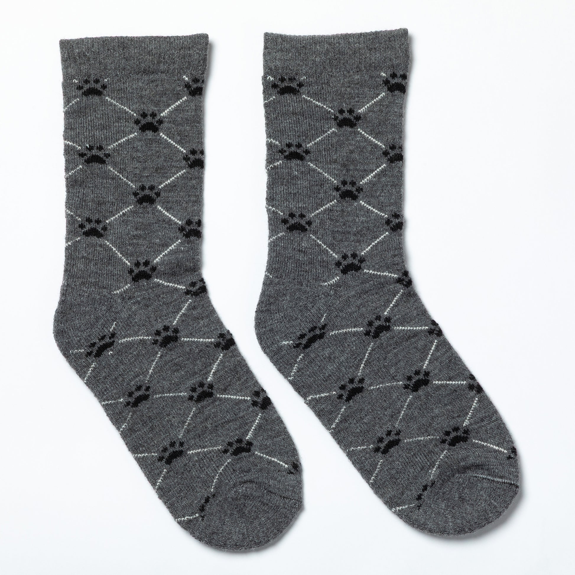 Gray socks with black paw print pattern on a white background