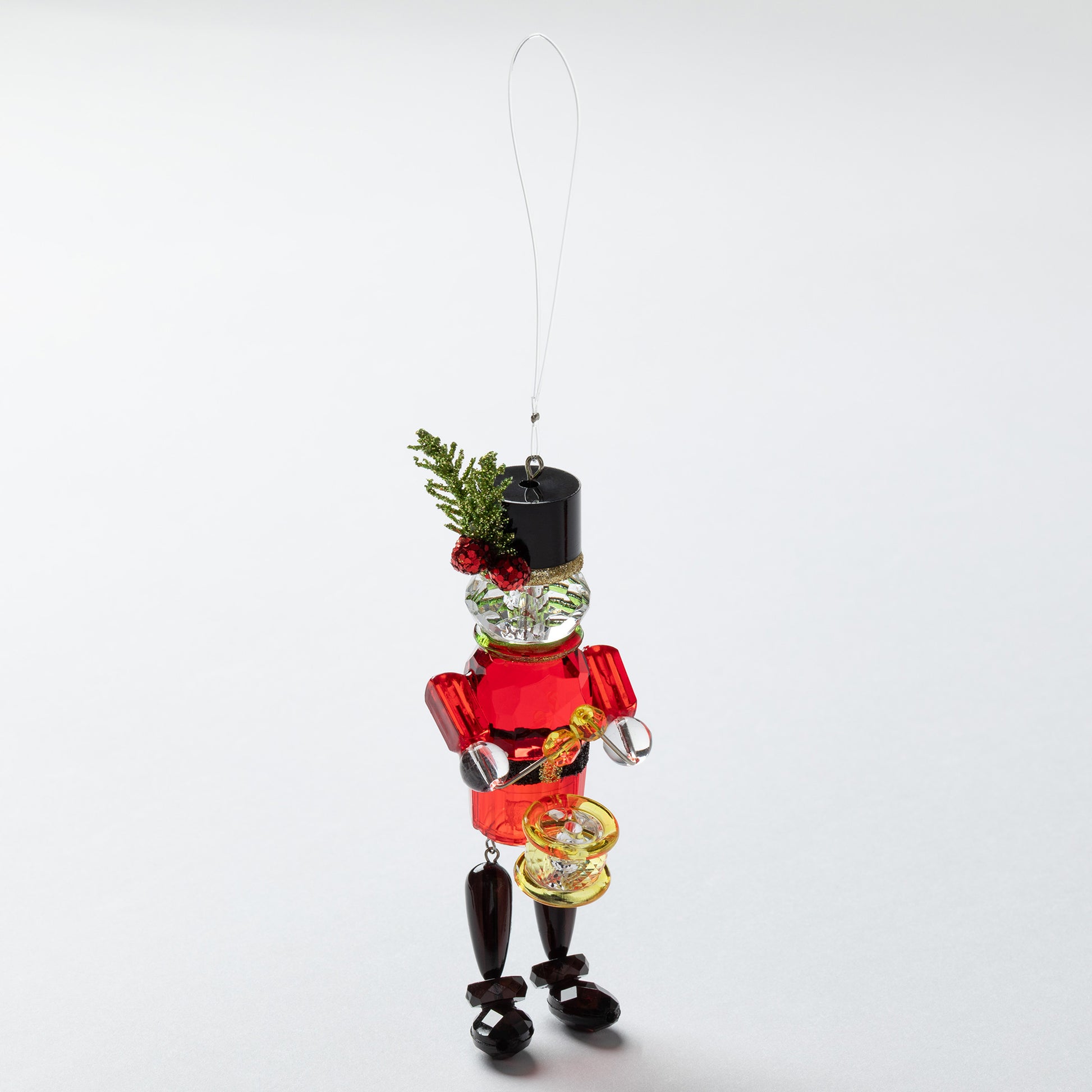 Decorative Christmas nutcracker ornament on a white background