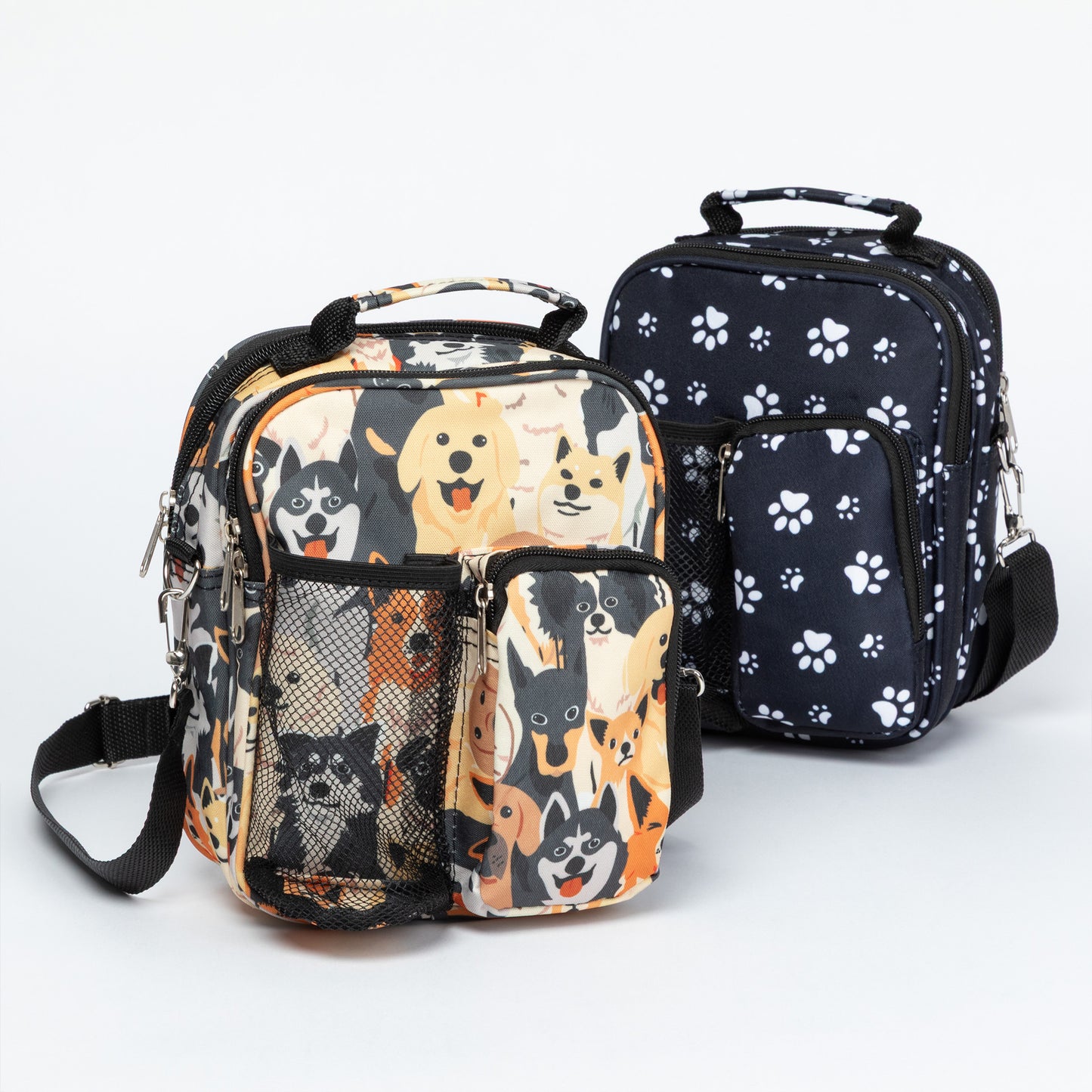 Two backpacks, one with dog pattern and the other with paw print pattern, on a white background.