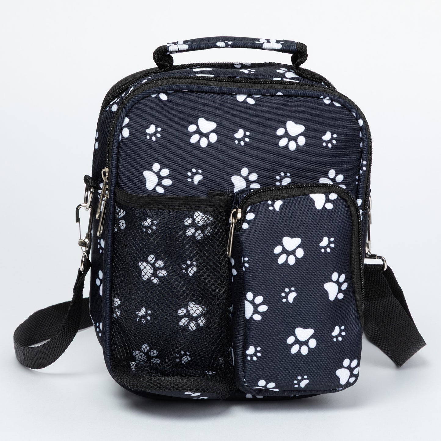 Navy blue backpack with white paw prints on a light gray background