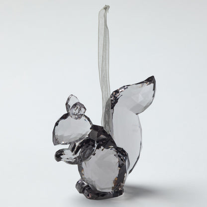 Crystal squirrel figurine on a white background