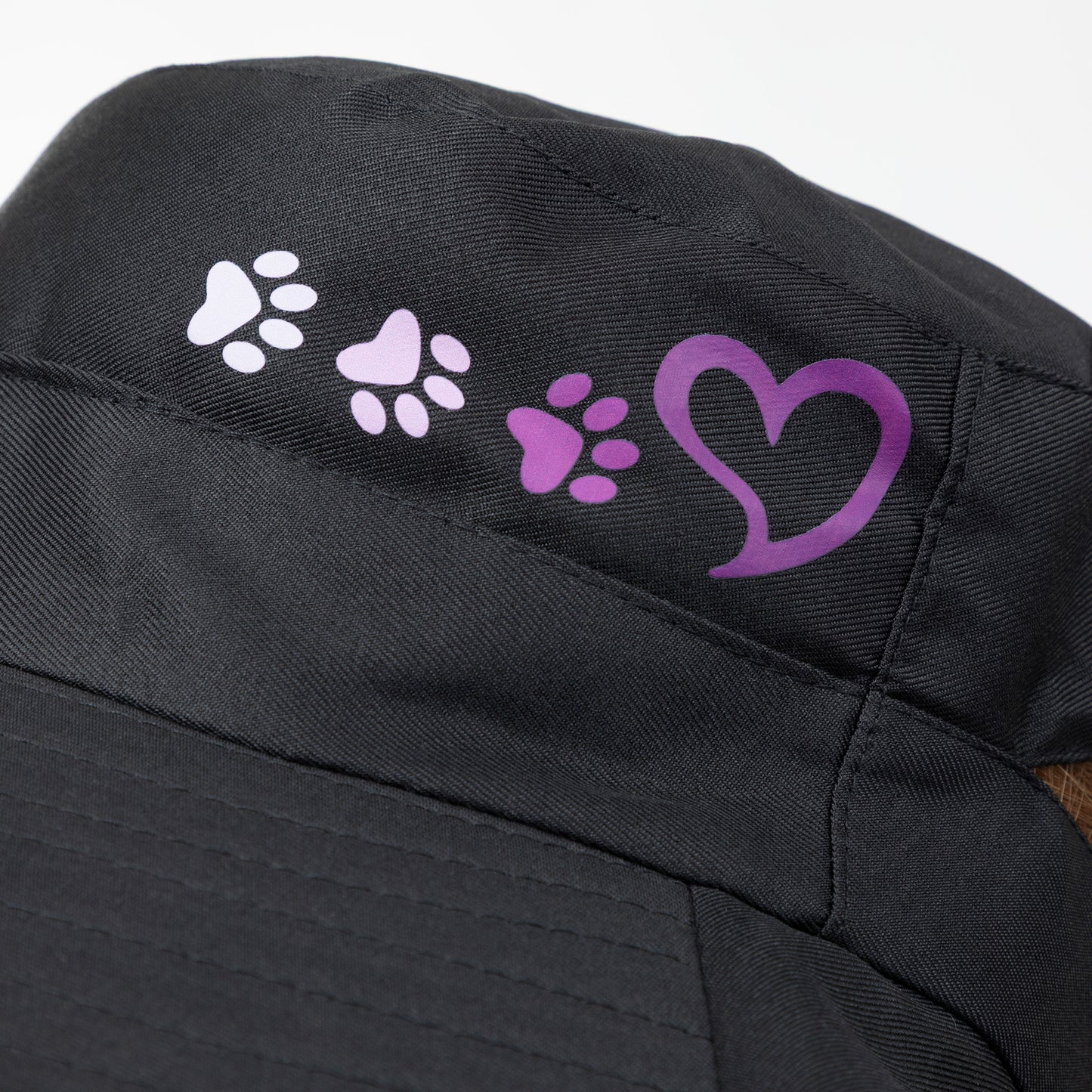 Black sun hat with purple heart and paw prints on a white background