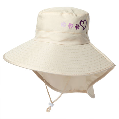 Beige sun hat with paw prints and a heart on a white background