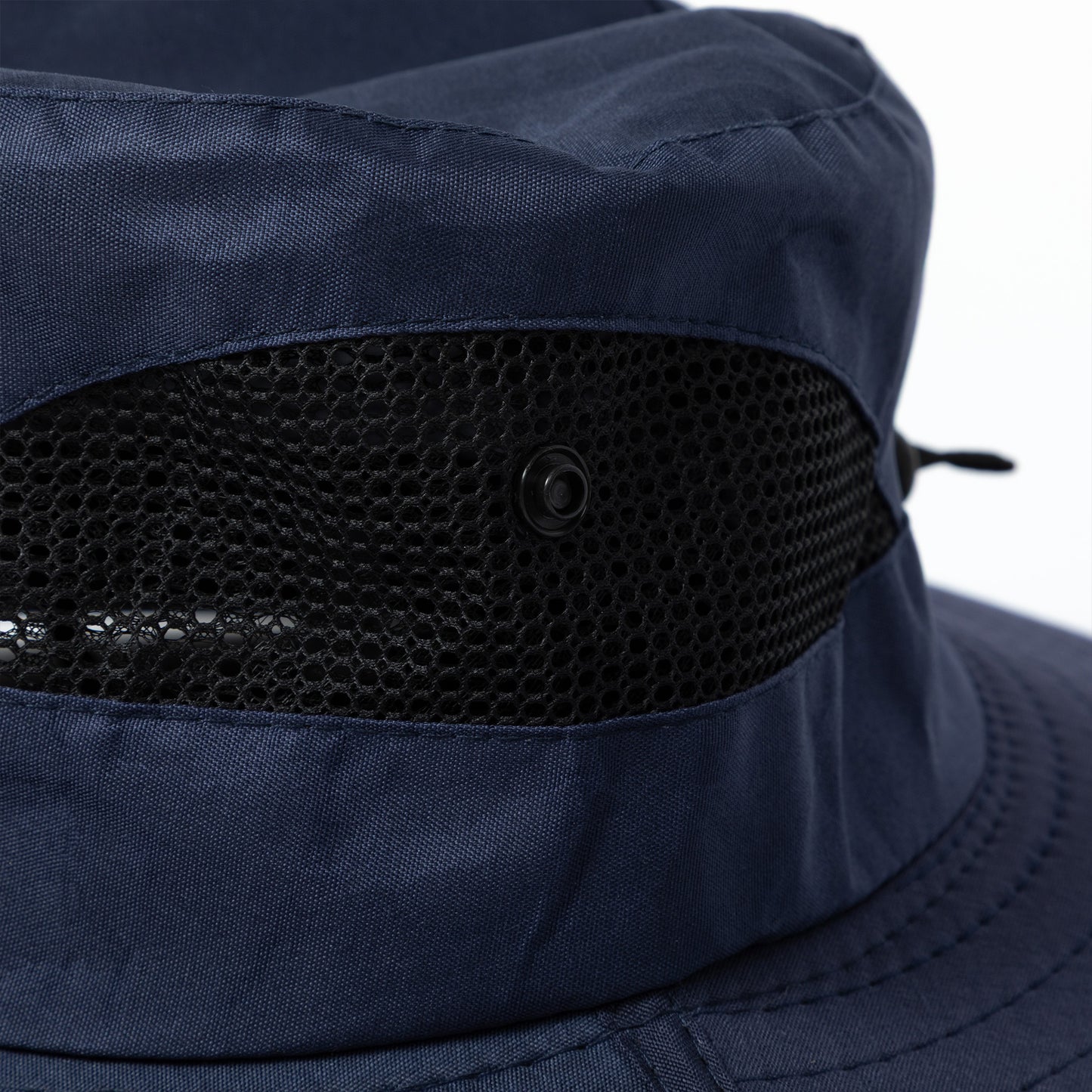 Navy blue bucket hat with black mesh ventilation on a white background