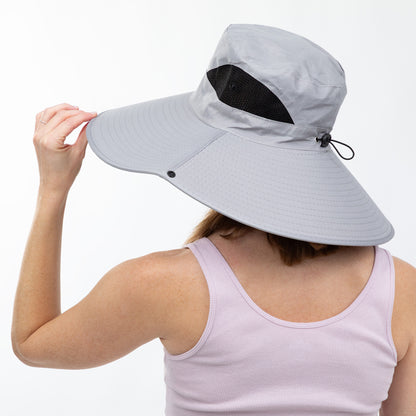 Person wearing a wide-brimmed sun hat with neck cover on a white background