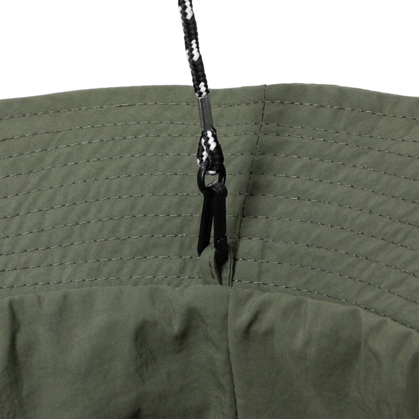 Close-up of a green bucket hat with adjustable chin strap on white background