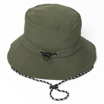 Green bucket hat with a chin strap on a white background