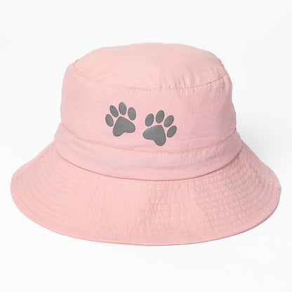 Pink bucket hat with paw prints on a white background