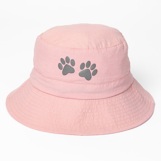 Pink bucket hat with paw prints on a white background