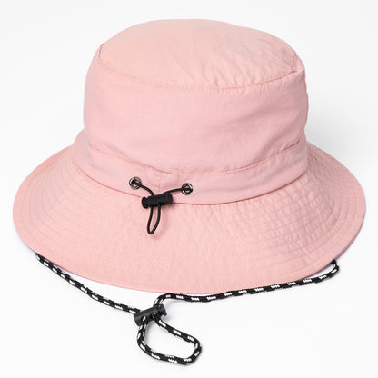 Pink bucket hat with a black drawstring on a white background