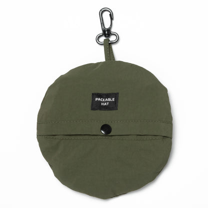 Green packable hat with a carabiner on a white background