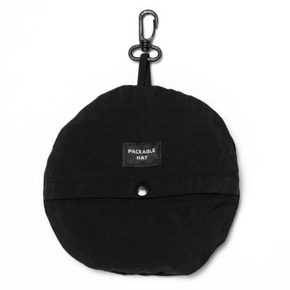 Black packable hat with a tag labeled 'Packable Hat' on a white background