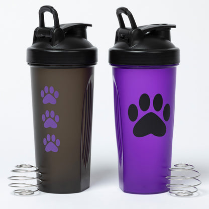 Two shaker bottles, one black and one purple, with paw prints on a white background.
