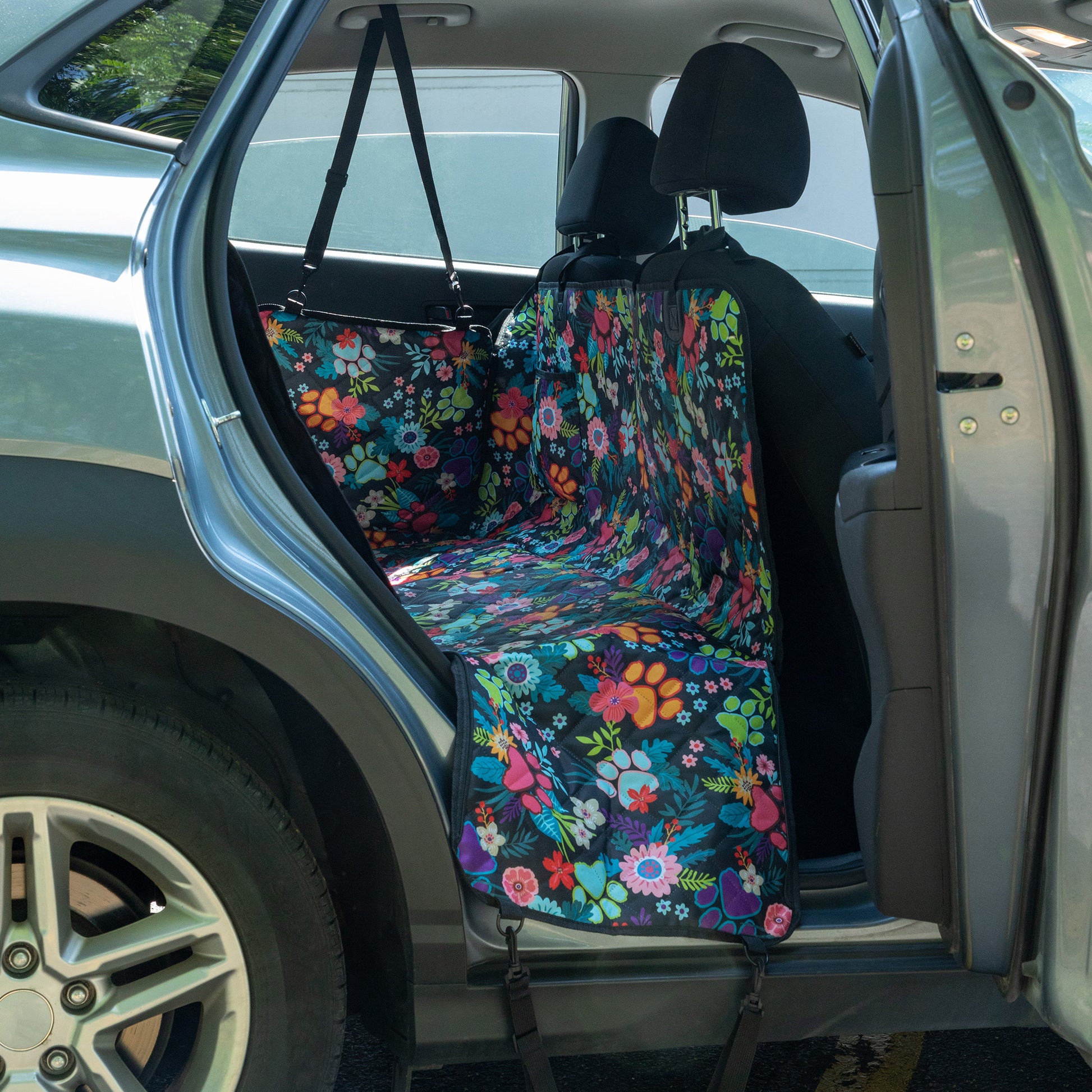 Car seat cover with floral pattern inside a vehicle