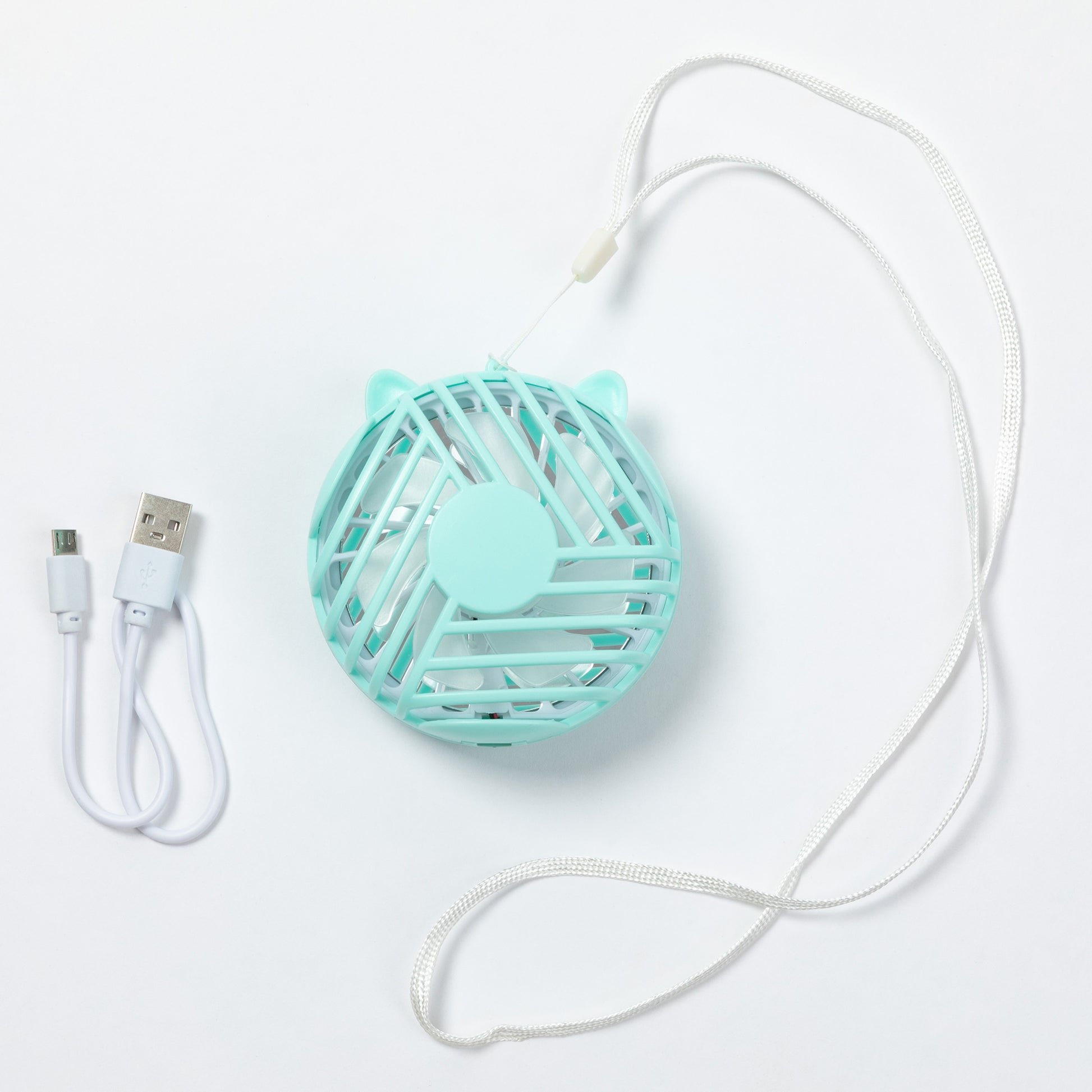 A small round portable fan in mint green with a white USB charging cable and white carrying strap, shown on a clean white background.