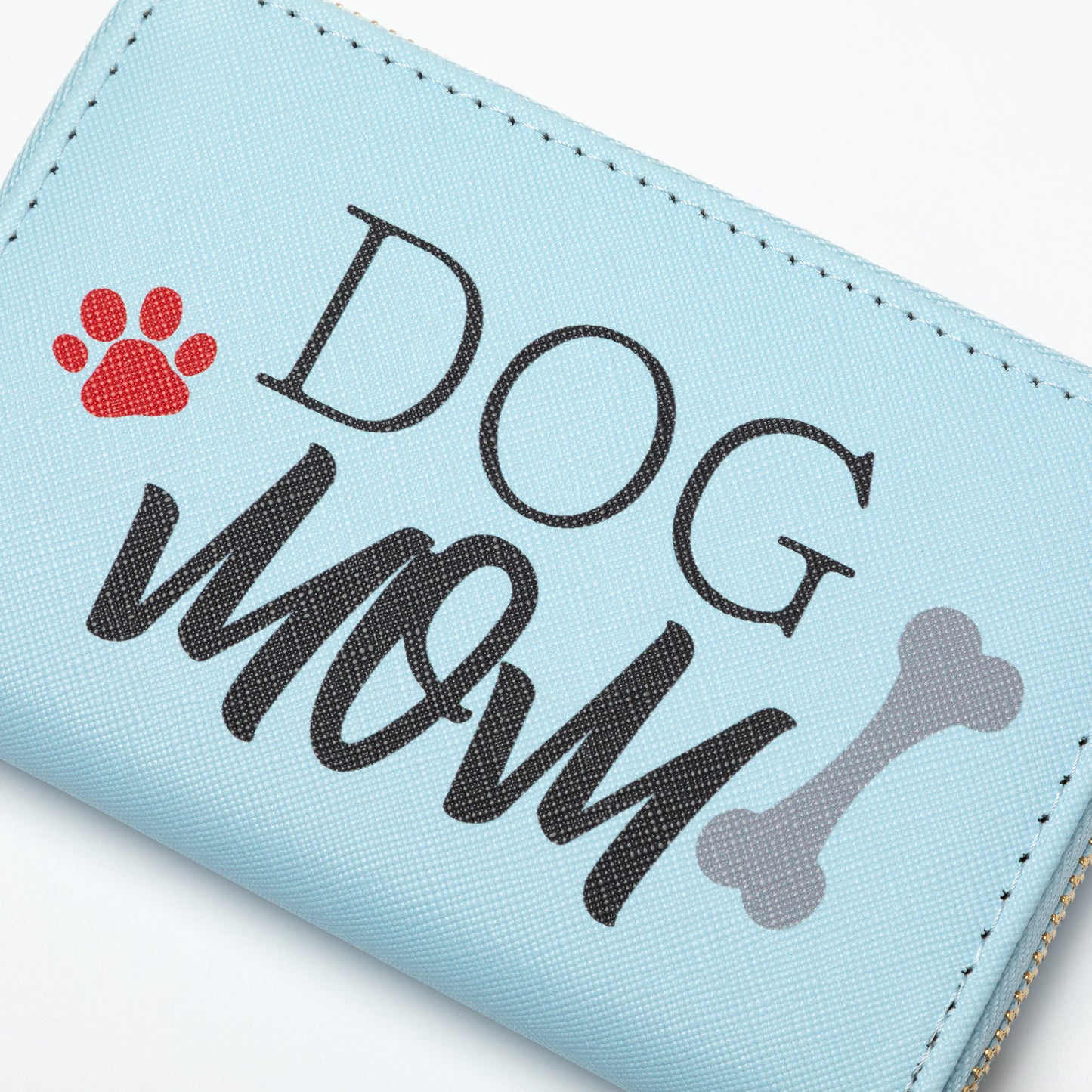Light blue wallet with 'DOG MOM' text and paw print design on a white background