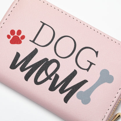 Pink wallet with 'DOG MOM' text and paw print and dog bone design on a white background