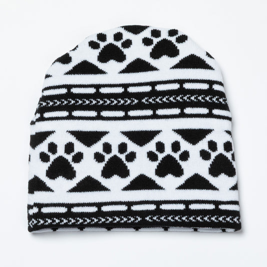 Black and white patterned beanie with paw prints on a white background