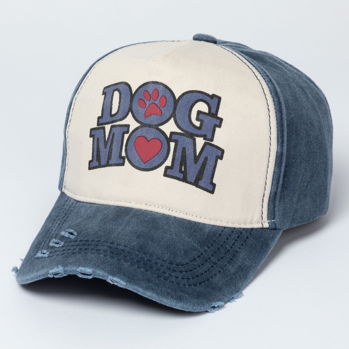 Cap with 'Dog Mom' text and paw print on a light gray background