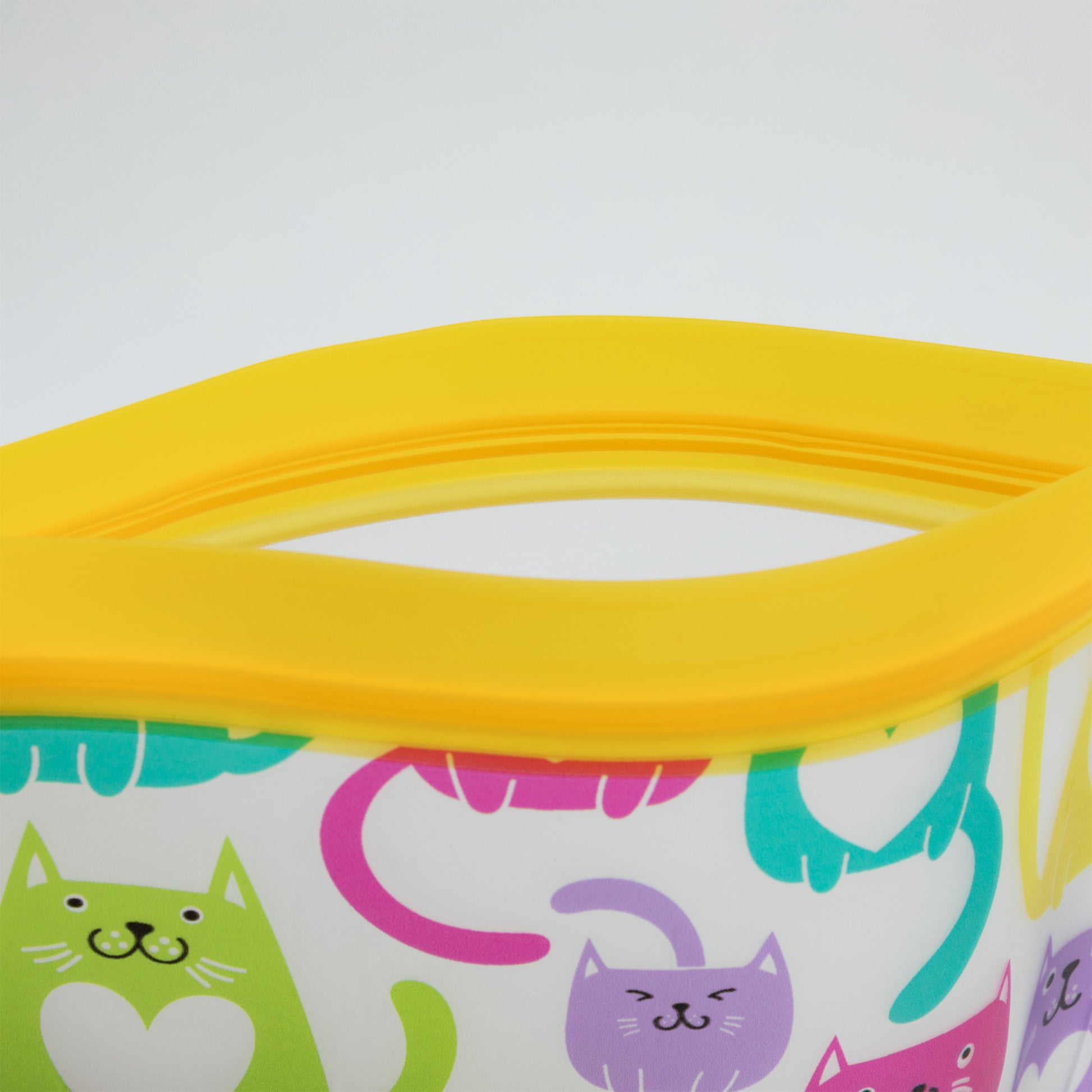 Container with a yellow zipper top and colorful cat pattern on a white background