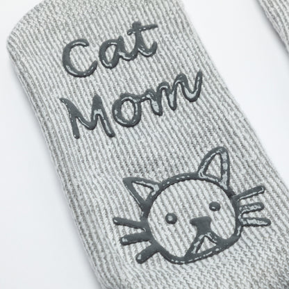 Gray sock with 'Cat Mom' text and cat face design on a white background