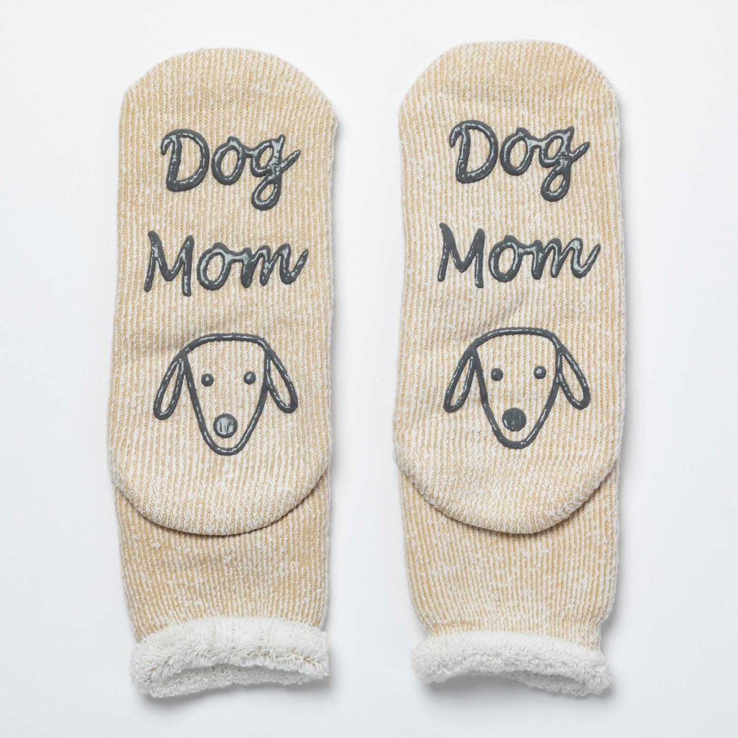 Pair of beige socks with 'Dog Mom' text and dog face design on a white background