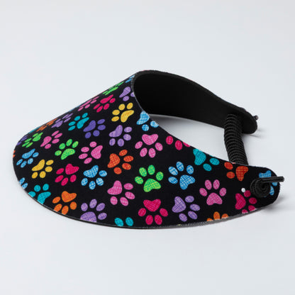 Foam visor with colorful paw pattern on a white background