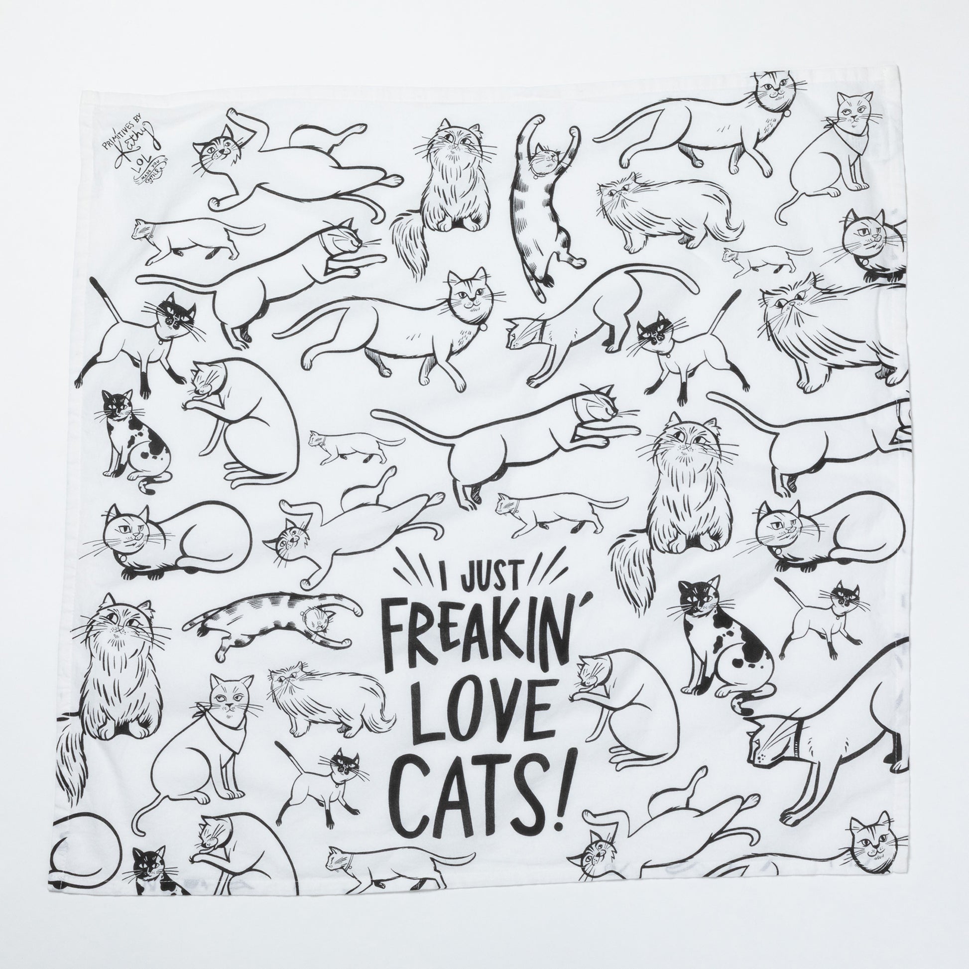 White towel with black line art of cats and text 'I just freakin' love cats!' on a white background