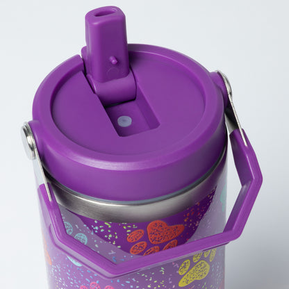 A close-up of a purple insulated water bottle with a matching purple lid and carry handle, featuring a colorful pattern of hearts and paw prints on the lower half.