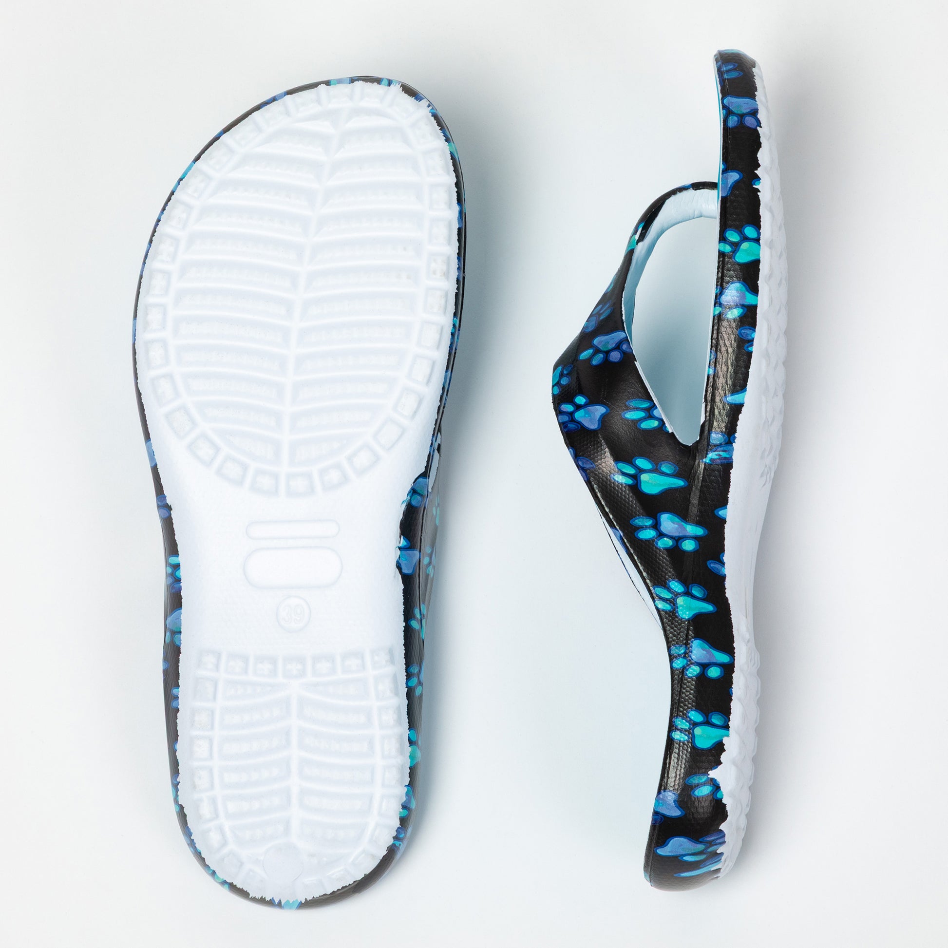 Pair of sandals with blue paw print pattern on a white background