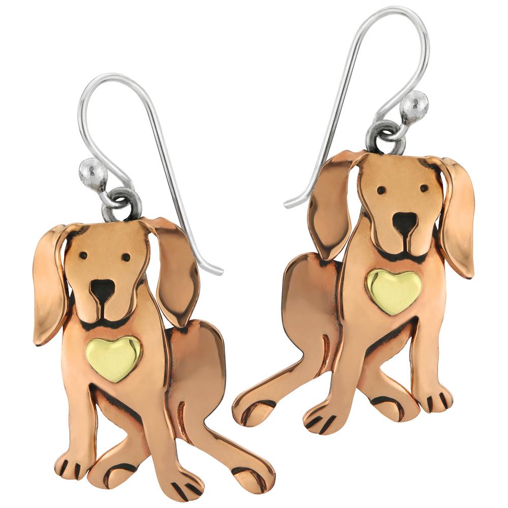 Dog-shaped copper earrings with heart details on a white background