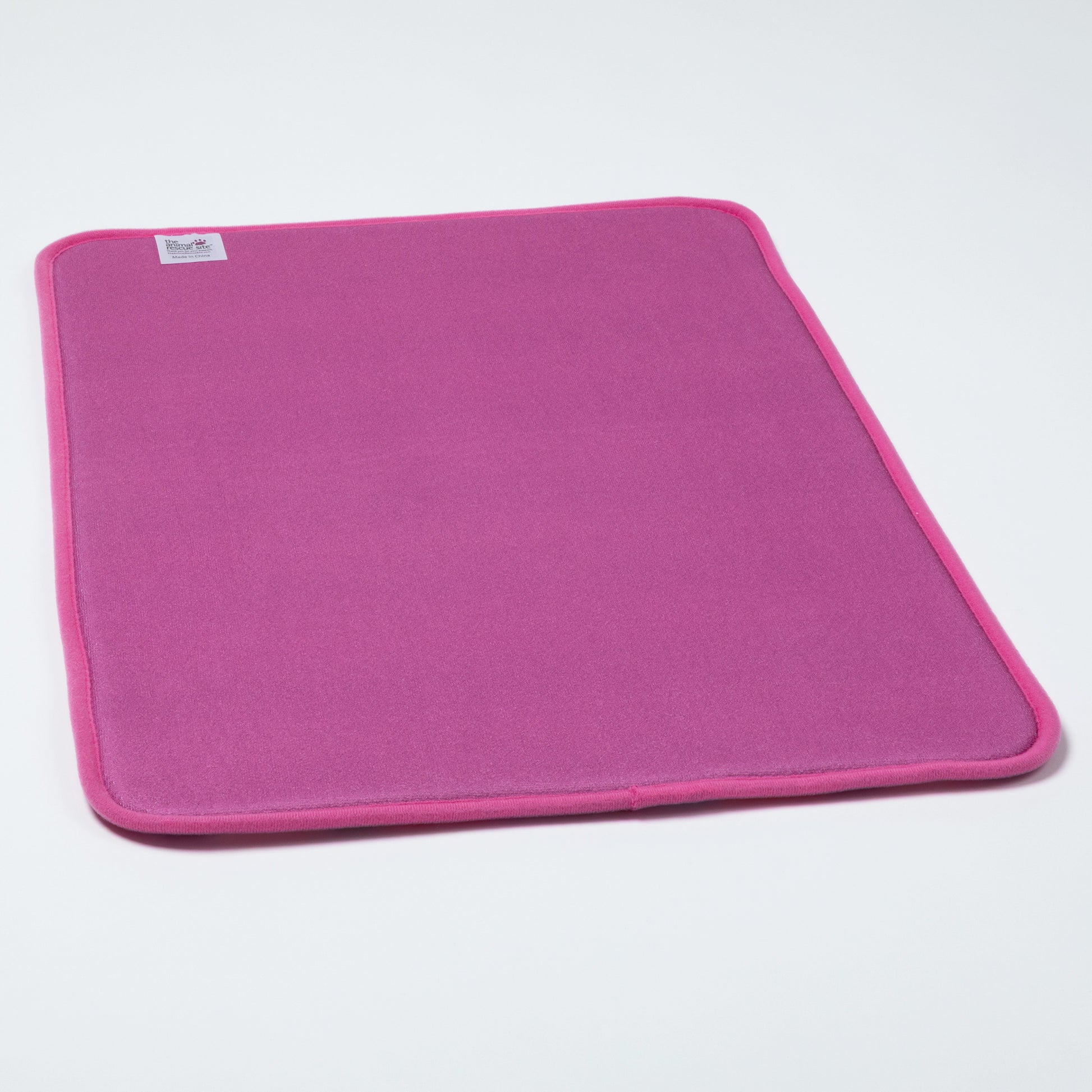 Pink mat on a white background
