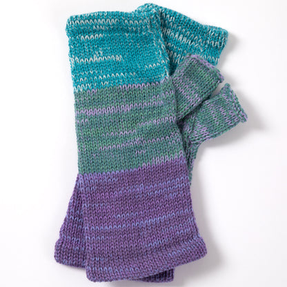 a pair of alpaca fingerless mittens in shades of blue, green, and purple made from alpaca wool on a white background