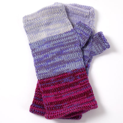 a pair of alpaca fingerless mittens in the color purple made from alpaca wool