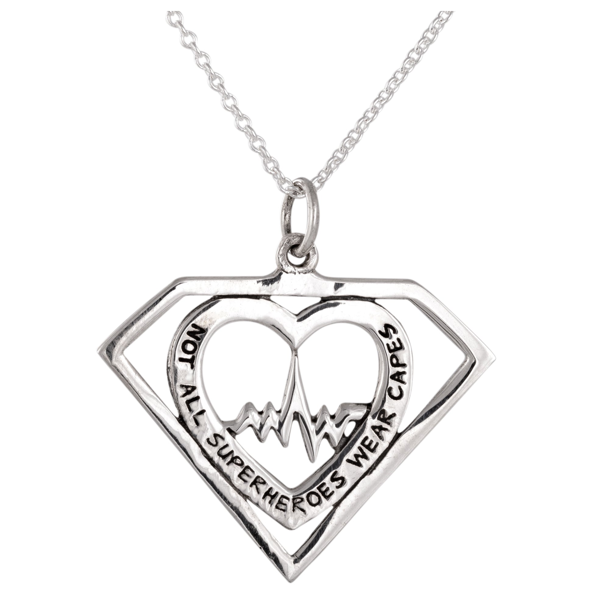 Silver pendant with heart design and 'Not all superheroes wear capes' text on a white background