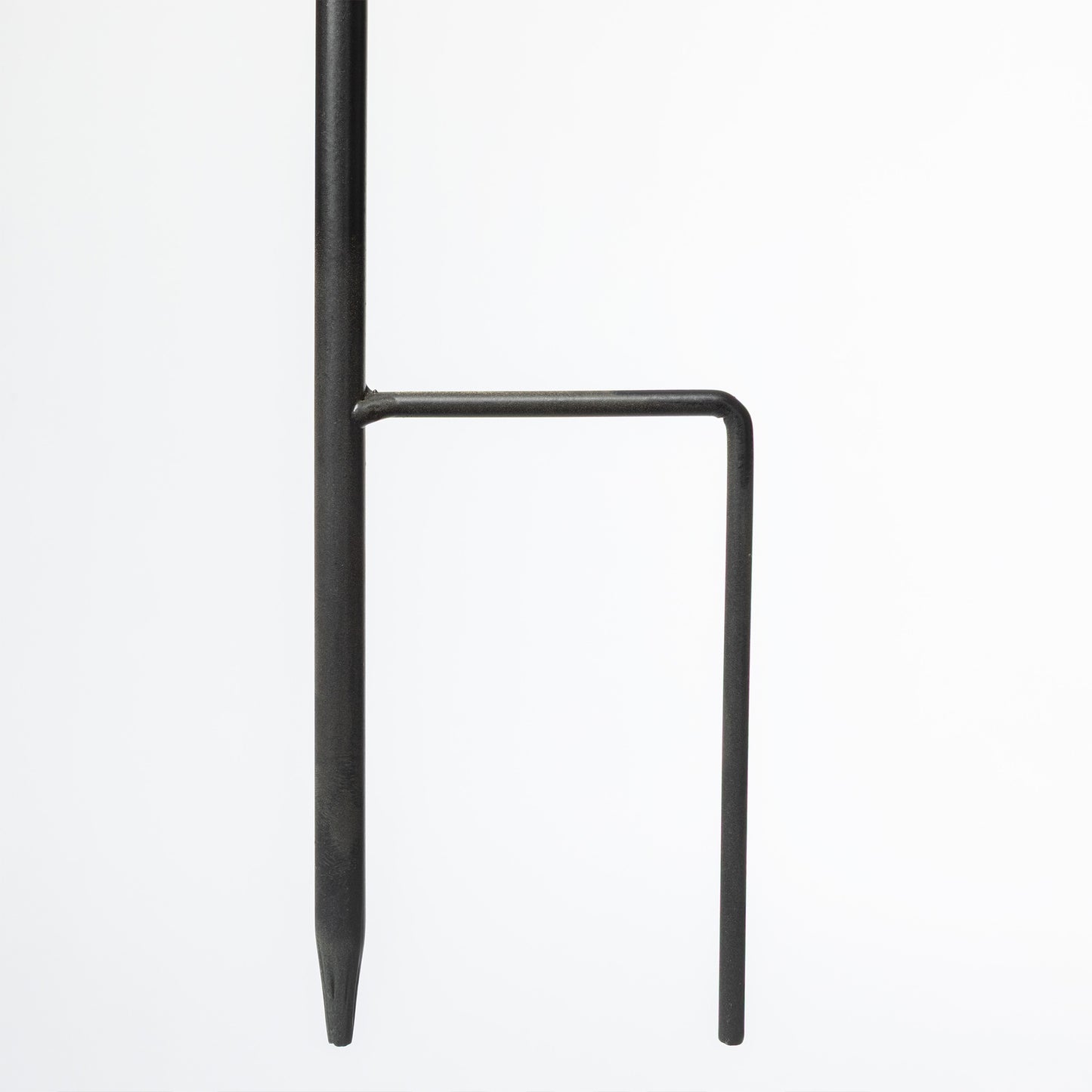 Black metal stake end on a white background