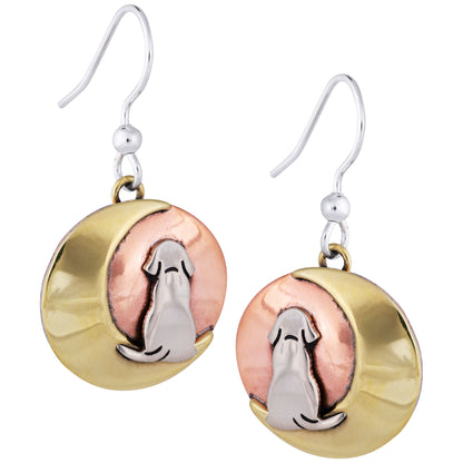 Pair of earrings with brass and copper circular designs featuring a dog silhouette on a white background.