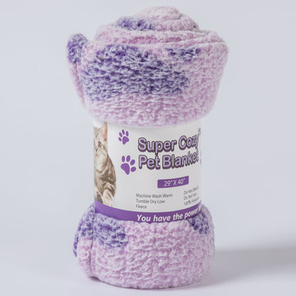 A roll of Super Cozy Pet Blanket in a lavender and purple marled texture, wrapped in a white paper label with a cat picture and product details, on a light gray background.