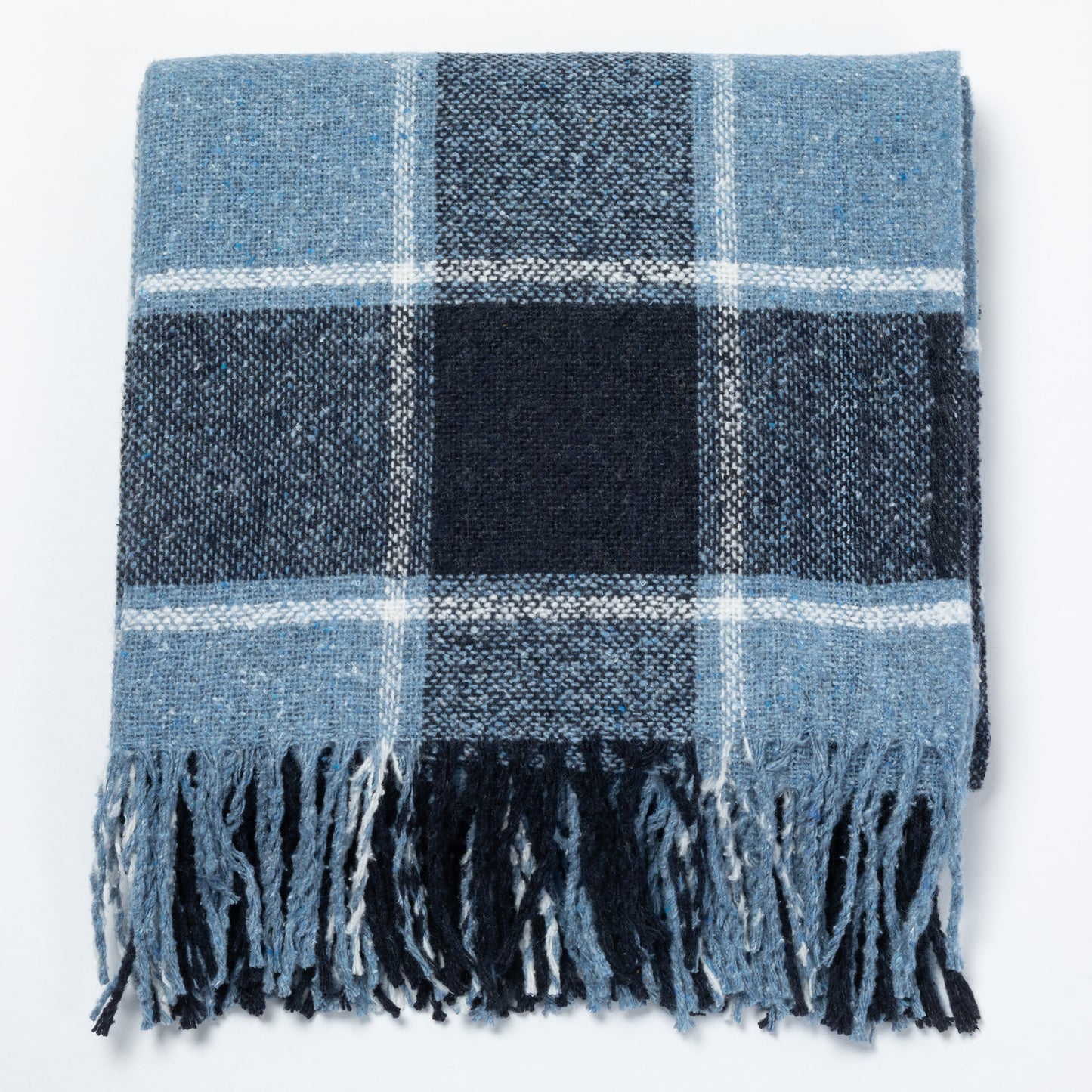 Cozy blue plaid throw blanket with fringed edges, perfect for warmth and style.
