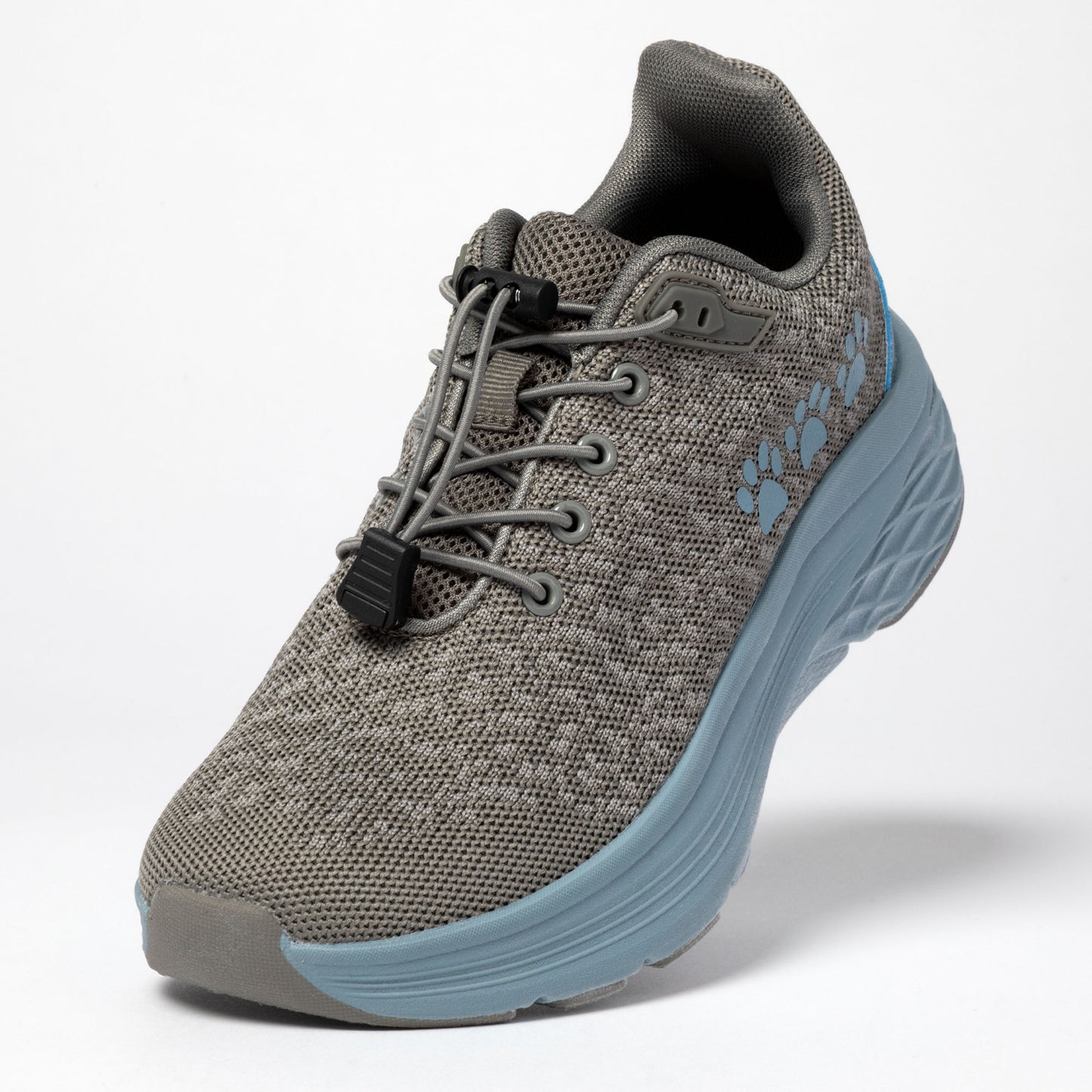 Gray athletic shoe with a blue sole, gray laces, and three blue paw prints on the side, on a white background.