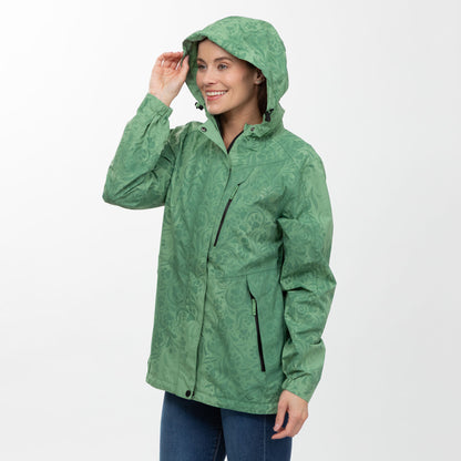 Woman wearing a green raincoat on a white background